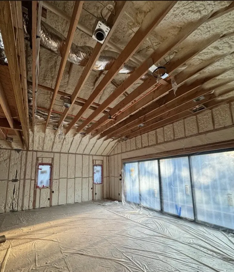 Interior walls and ceiling insulated with spray foam during new construction in Foley